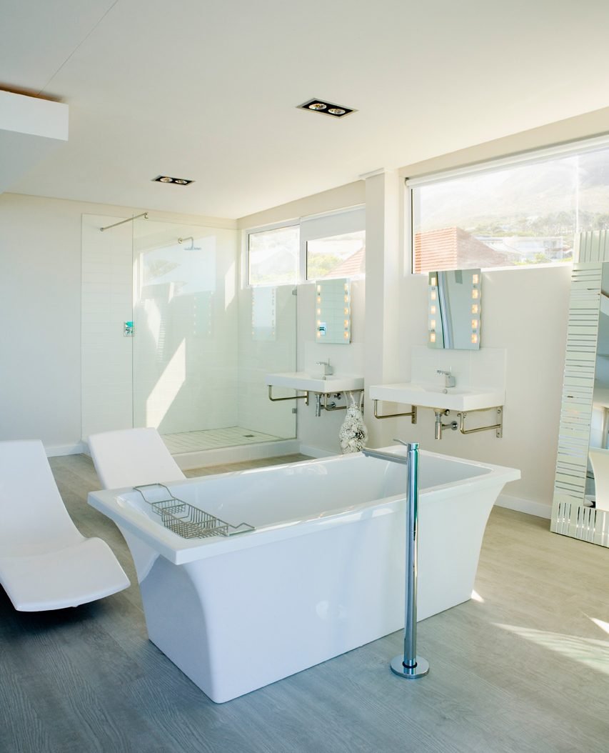 Clean modern bathroom — fixture and finish plumbing by Leone & Sons, Syracuse NY